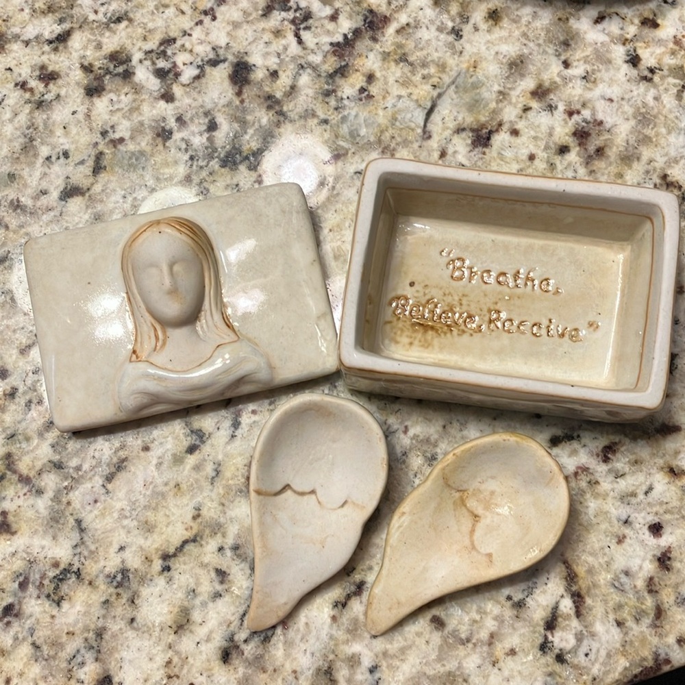 Angel trinket box with wings.